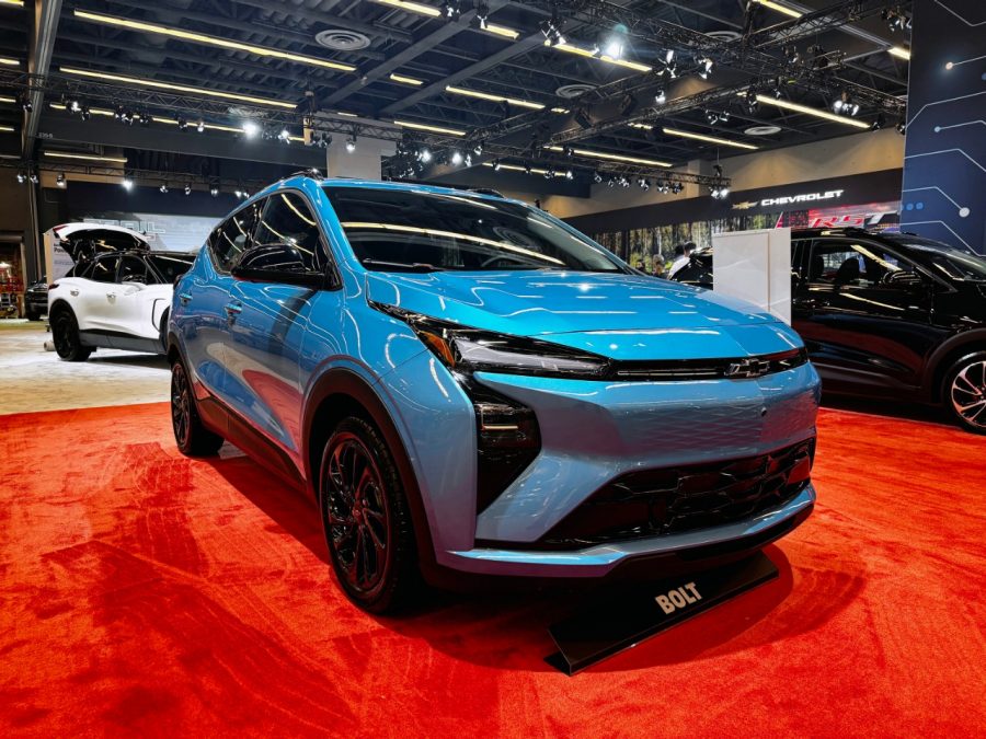 2027 Chevrolet Bolt in light blue at the Montreal International Auto Show