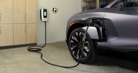  A GM vehicle EV charging at a home garage.