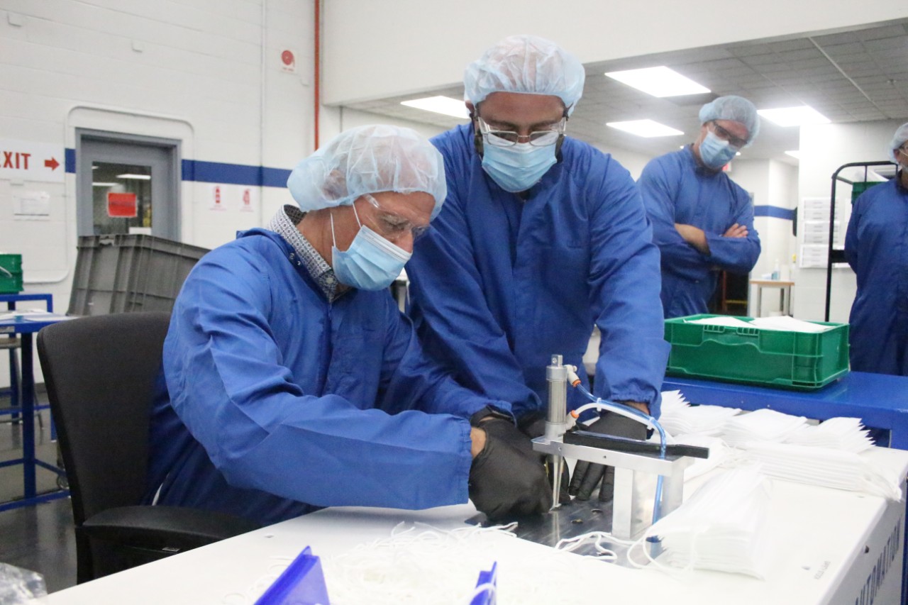 Man Charging His Chevrolet Bolt EV at an EVgo Charging Statio